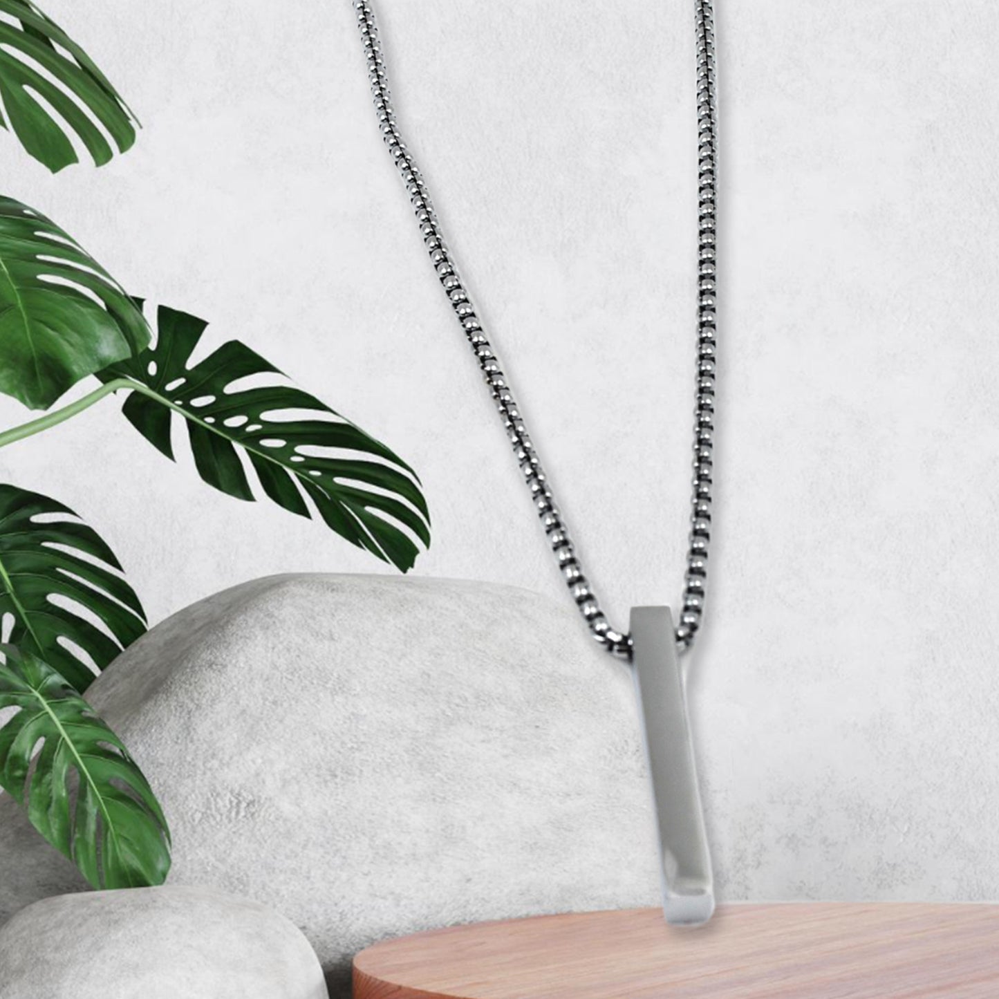 Stainless steel locket necklace on a stylish chain with modern design, perfect for daily wear