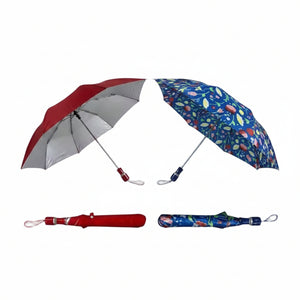 Two 2-fold manual umbrellas shown open and closed on a white background with text reading 'PACK OF 2', '2-Fold Manual Umbrella', 'Red & Random Print', and a small 'FDBF SHOPPING' logo on the red umbrella.