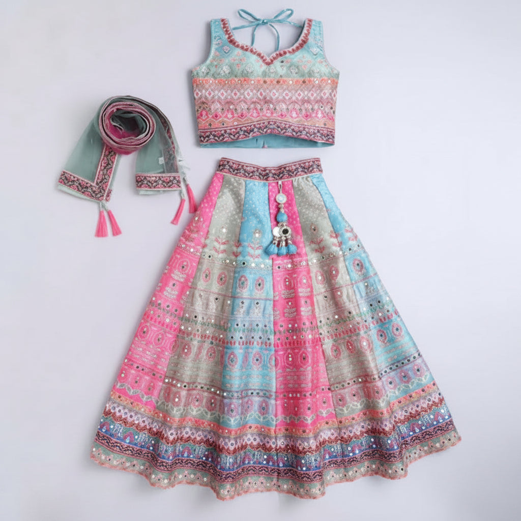 Colorful traditional outfit with a top and skirt on a white background