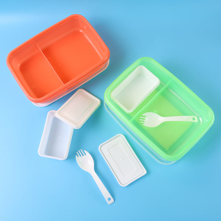 Kids cartoon lunch box set in orange and green with removable containers and fork for fun meals