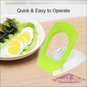 Bright green kitchen egg slicer for easy and quick slicing of boiled eggs