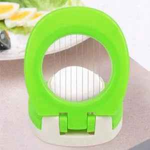 Bright green kitchen egg slicer for perfectly sliced eggs with easy grip design