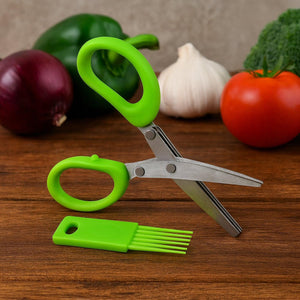 Multipurpose kitchen scissors with green handles, perfect for cutting vegetables in the kitchen