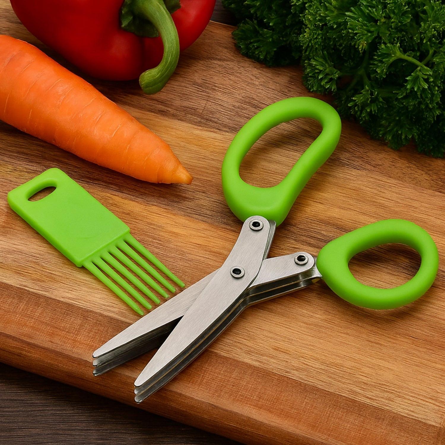Superior eMart multipurpose kitchen scissors with green handles and a vegetable brush on a wooden cutting board