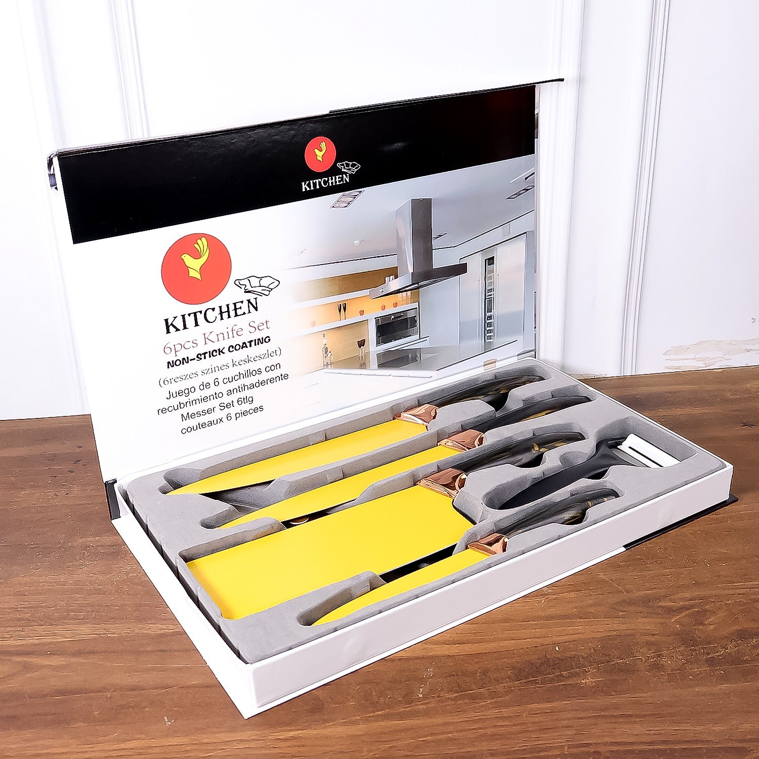 Professional kitchen knife set in a sleek box featuring six non-stick coated knives for culinary enthusiasts