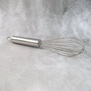 Small stainless steel balloon whisk with a sturdy handle for effortless mixing and whisking in the kitchen