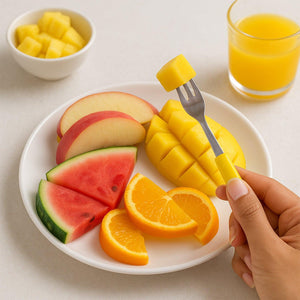 Superior eMart stainless steel big fork set displayed with fresh fruit on a white plate