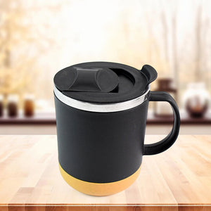 Superior eMart insulated coffee mug with black matte finish and yellow base on wooden table