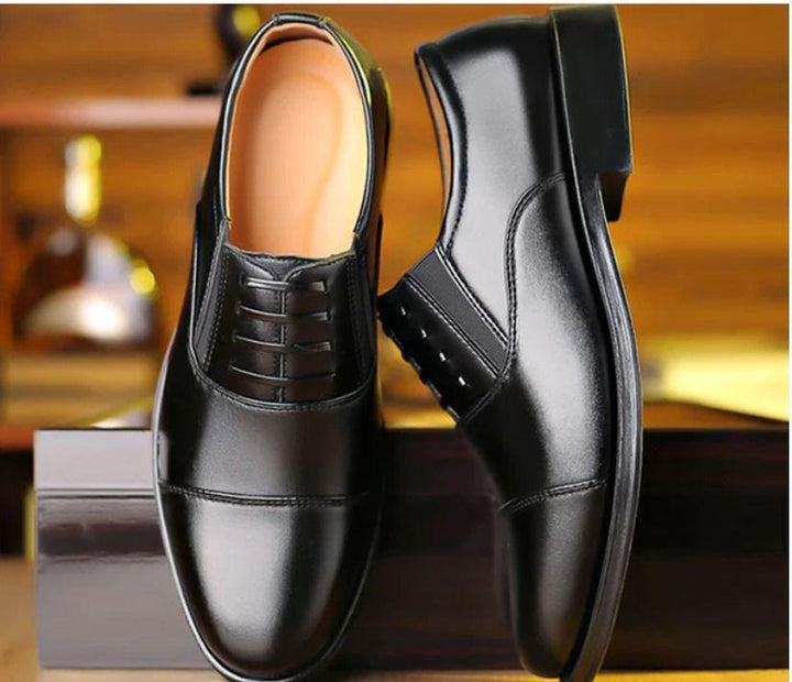 Black polished cap toe lace up men's smart formal shoes with tan cushioned interior pair
