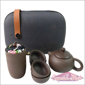 Kung Fu tea set portable in a stylish case with teapot, cups, and tea storage