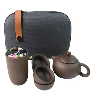Kung Fu tea set portable in a stylish case with teapot, cups, and tea storage