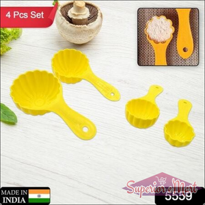 Bright yellow ladoo mould spoon set in four sizes for easy cooking and baking preparations