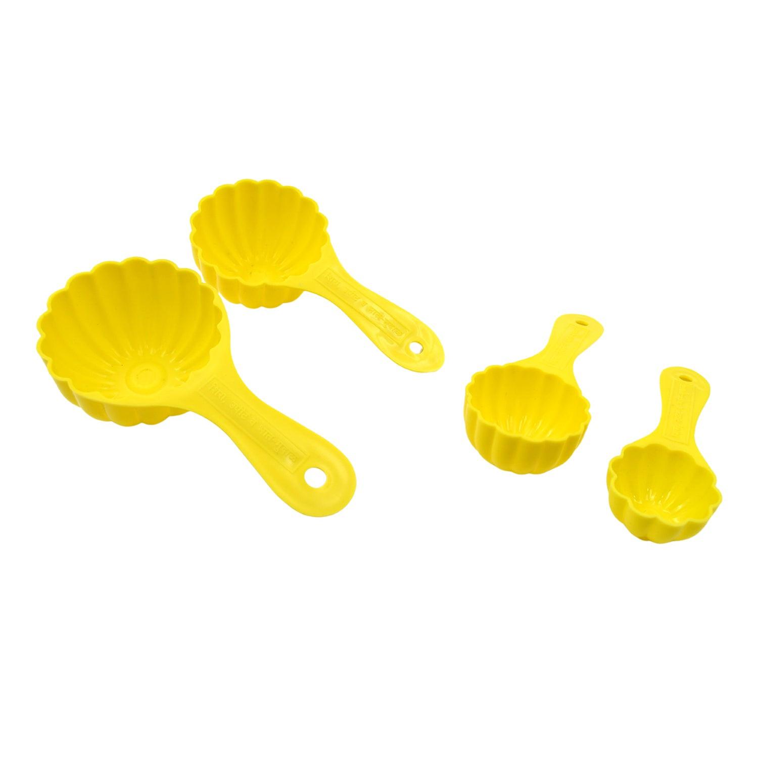 Ladoo mould spoon set in bright yellow, featuring four different sizes for easy portioning of traditional sweets