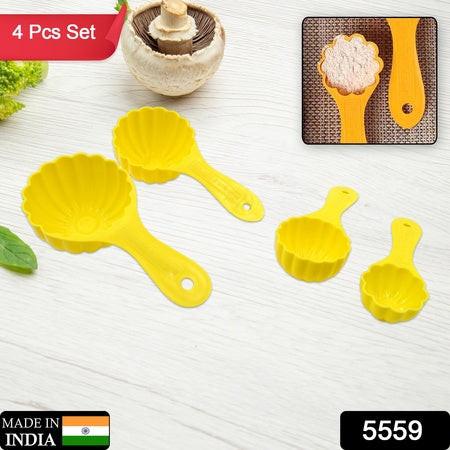 Bright yellow ladoo mould spoon set in four sizes for easy cooking and baking preparations