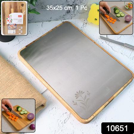 Large stainless steel cutting board with wooden base for versatile kitchen use and easy food preparation