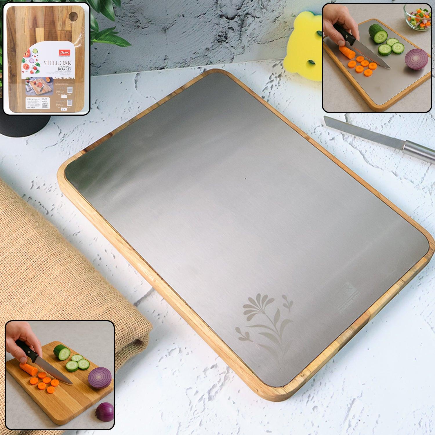 Large stainless steel cutting board with bamboo edges and vegetables being sliced for meal prep