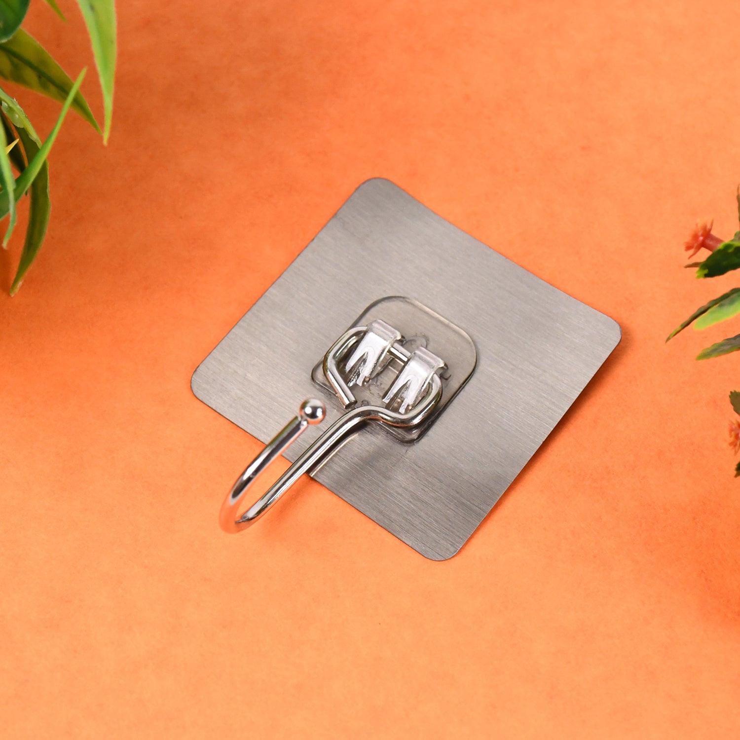 Large stainless steel wall hook for organizing coats and bags in home or kitchen