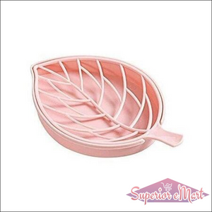 Leaf shape soap holder in pink with a decorative leaf design for stylish bathroom decor