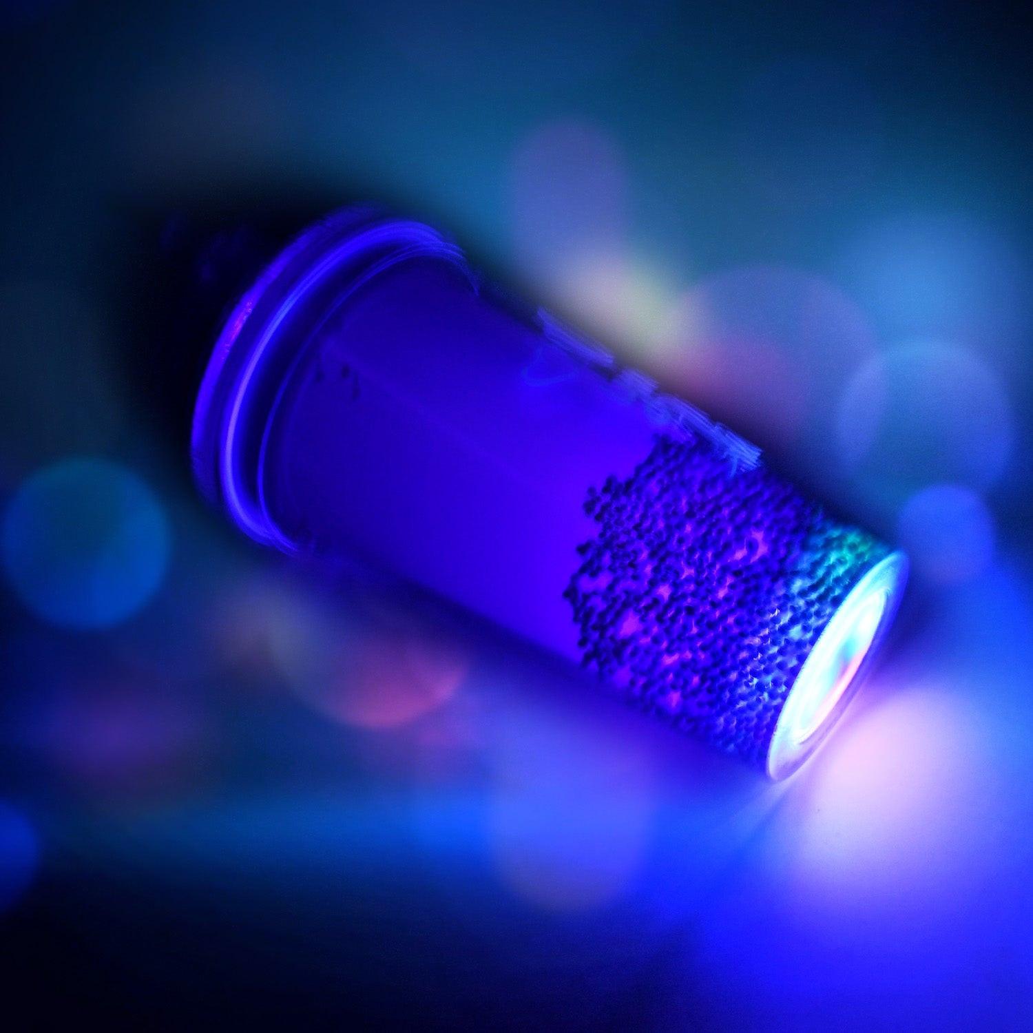 LED glow sipper bottle for kids with vibrant lighting effects and a colorful design