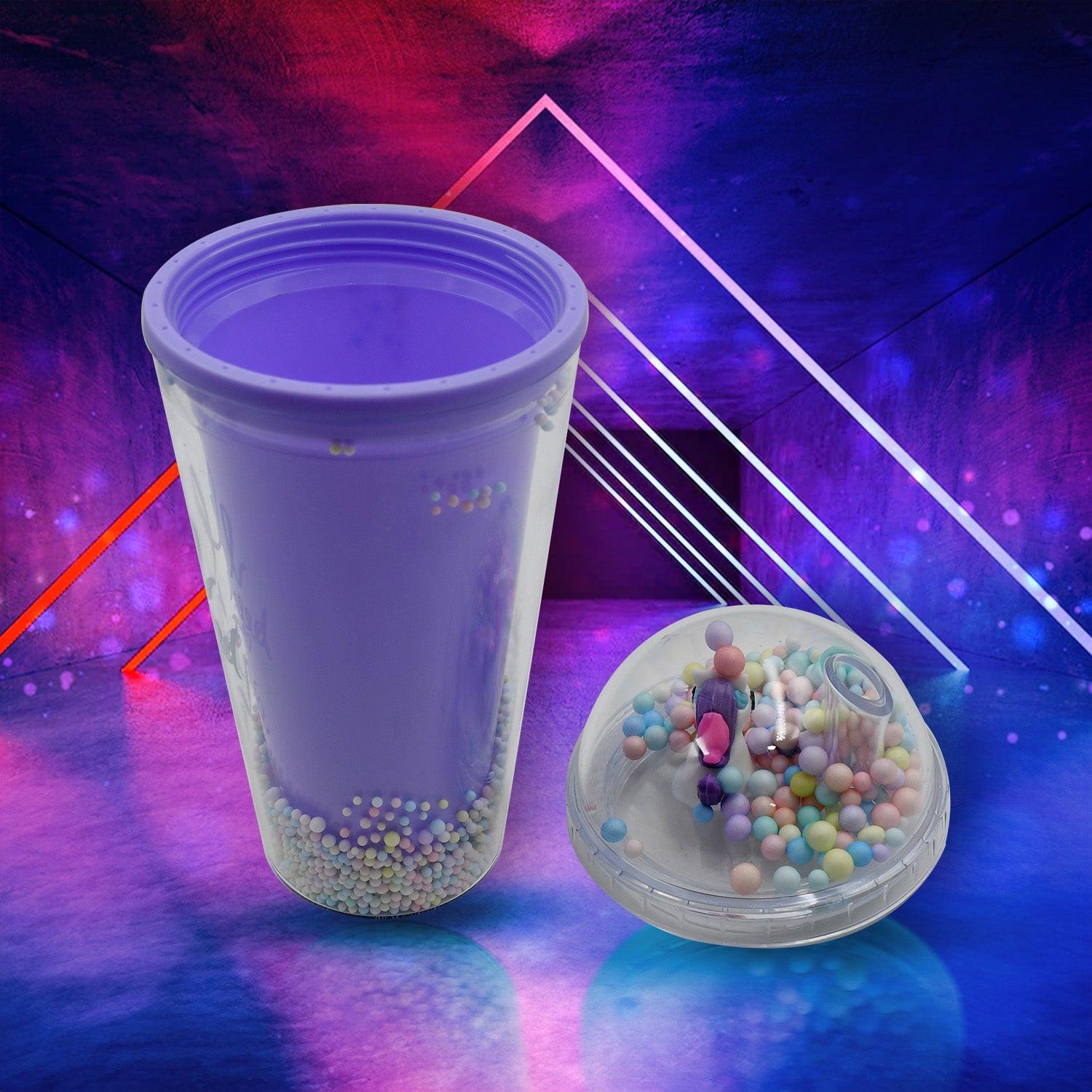 LED glow sipper bottle for kids with colorful beads and a fun design in a vibrant setting