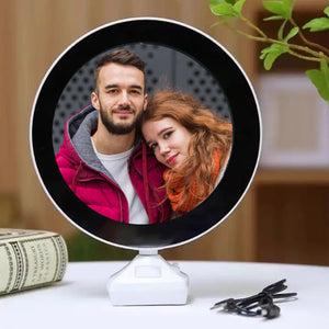 LED mirror photo frame displaying a couple's portrait in a stylish round design for home decor