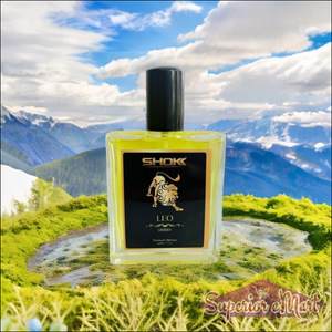 Leo zodiac unisex perfume 50ml bottle displayed in a scenic mountain landscape