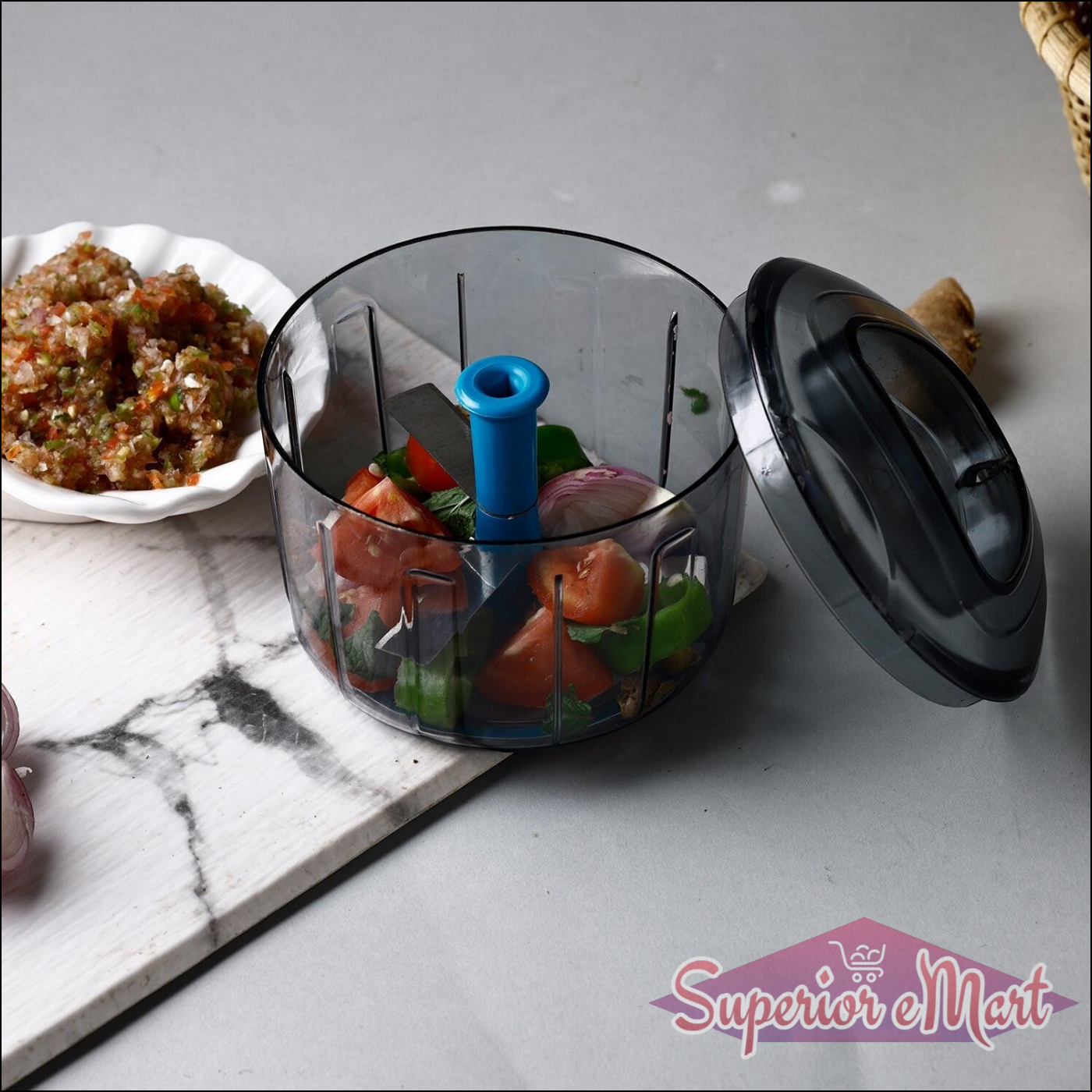 Lock unlock push chopper filled with fresh vegetables for easy meal preparation