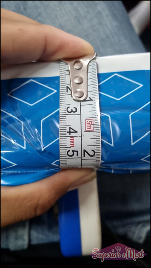Superior eMart perfume bottle with a measurement tape showing its size, long-lasting cologne for men