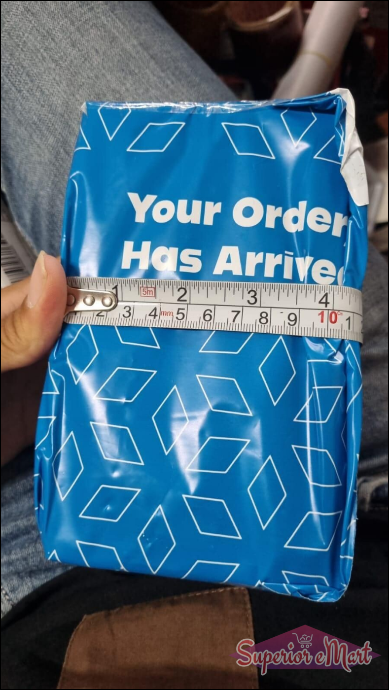 Blue shipping package for long-lasting cologne for men from Superior eMart with measuring tape for size reference