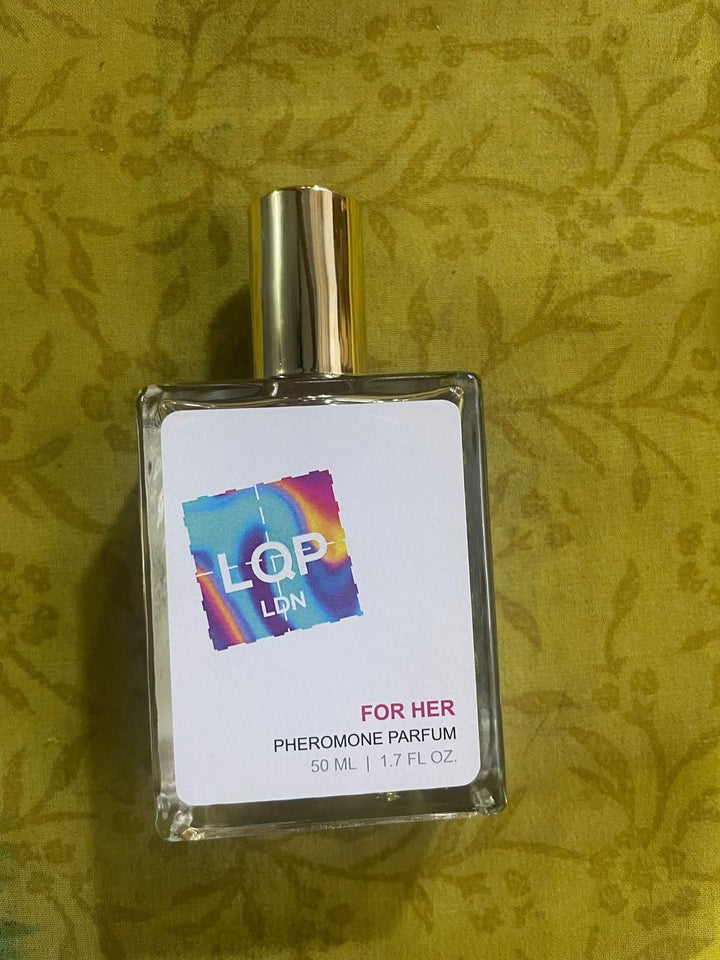 Superior eMart pheromone perfume for women 50 ml clear glass bottle with gold cap and colorful label