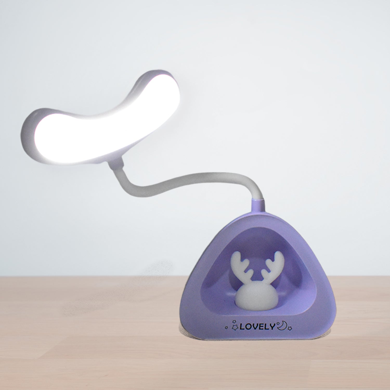 Cute LED desk lamp with flexible arm and unique design, perfect for adding charm to your workspace