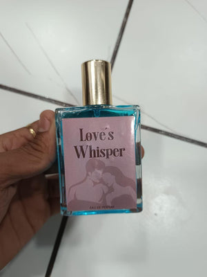Love's Whisper perfume 100 ml pack of 2 blue glass bottle with gold cap held in hand