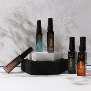 Luxury perfume combo pack featuring five elegant fragrance bottles in stylish display