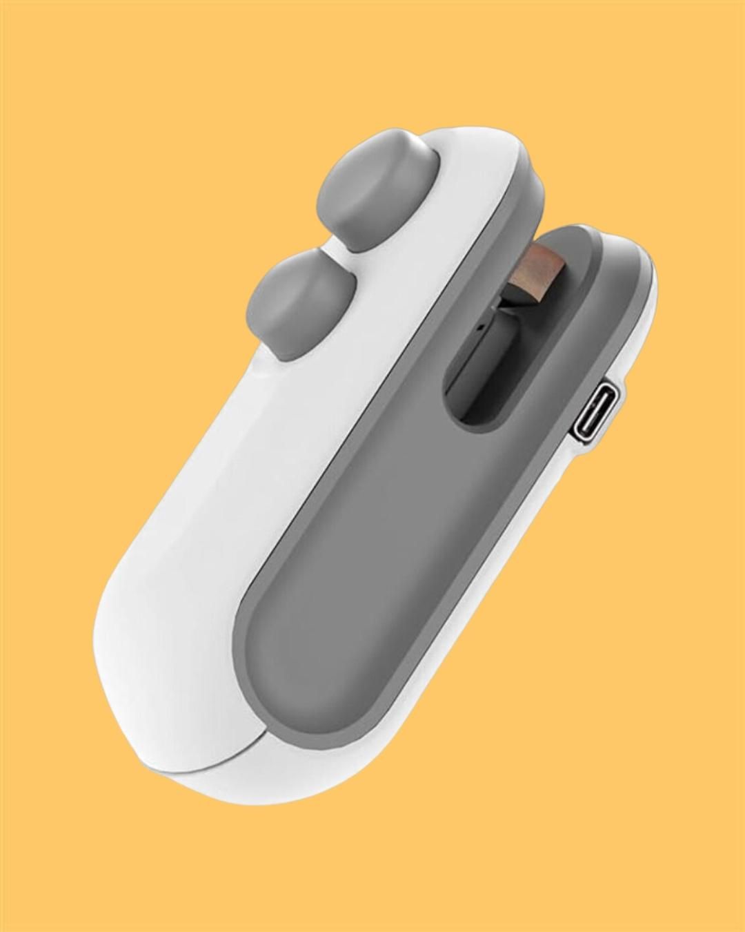 Compact magnetic heat sealer with cutter in white and gray for easy bag sealing