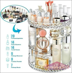 360 rotating clear acrylic vanity organizer with diamond trim, holding luxury perfumes, skincare, and brushes.