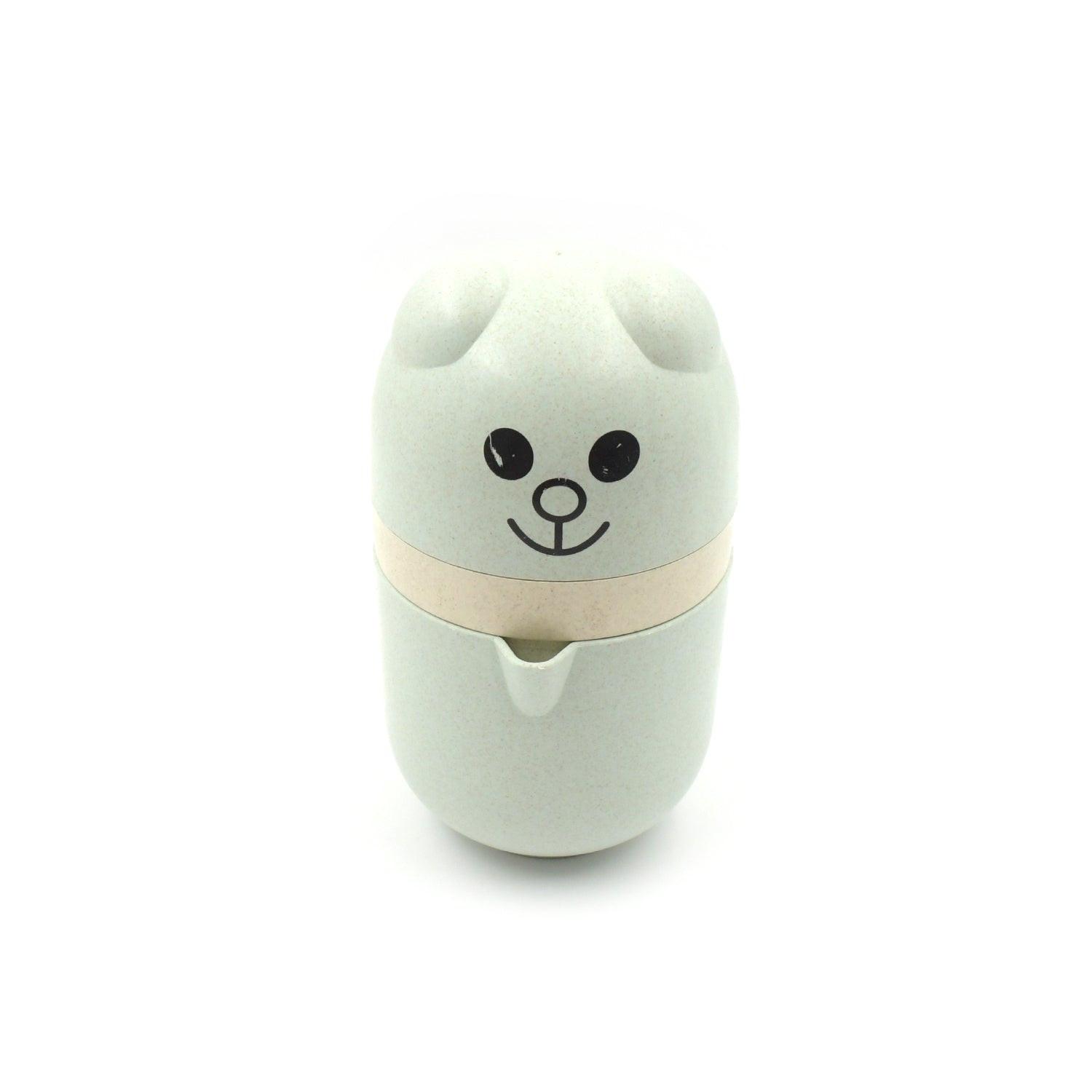 Cute bear-shaped manual citrus juicer with a smiling face for easy juice extraction