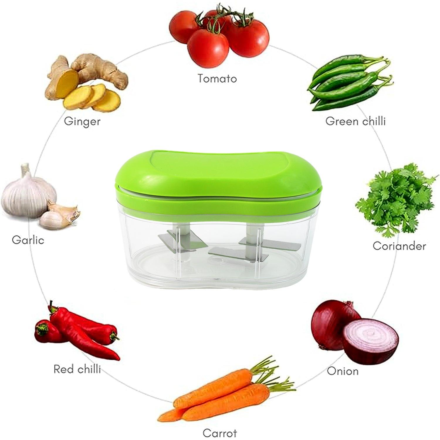 Manual garlic chopper with a green lid, perfect for chopping vegetables like onion, ginger, and chili