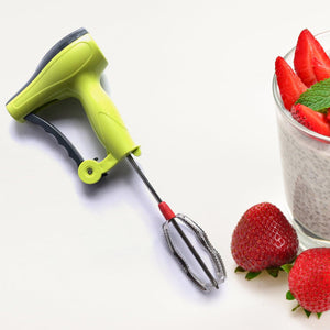 Manual hand blender stainless steel blades for blending smoothies with fresh strawberries