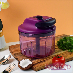 Manual vegetable chopper in purple with easy grip handle for chopping veggies quickly and efficiently