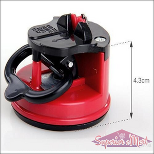 Manual kitchen knife sharpener in red and black, designed for effective sharpening with a compact design