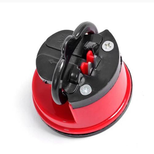Manual kitchen knife sharpener with a suction base for stable and effective sharpening