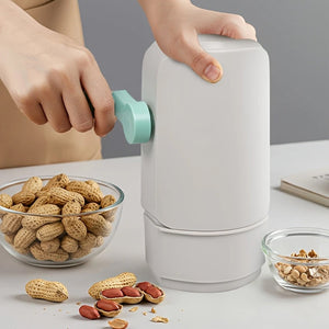 Manual peanut sheller machine in use for shelling peanuts effortlessly at home