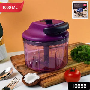 Purple manual vegetable chopper with a sturdy handle and transparent bowl for easy vegetable cutting