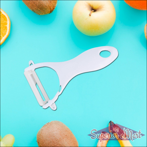 Marble coated kitchen knife set displayed with various fresh fruits on a turquoise background