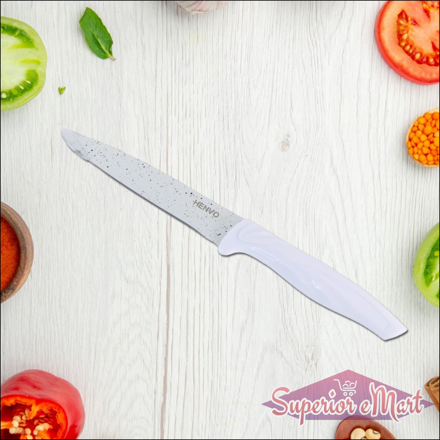 Marble coated kitchen knife set displayed among fresh vegetables for culinary preparation
