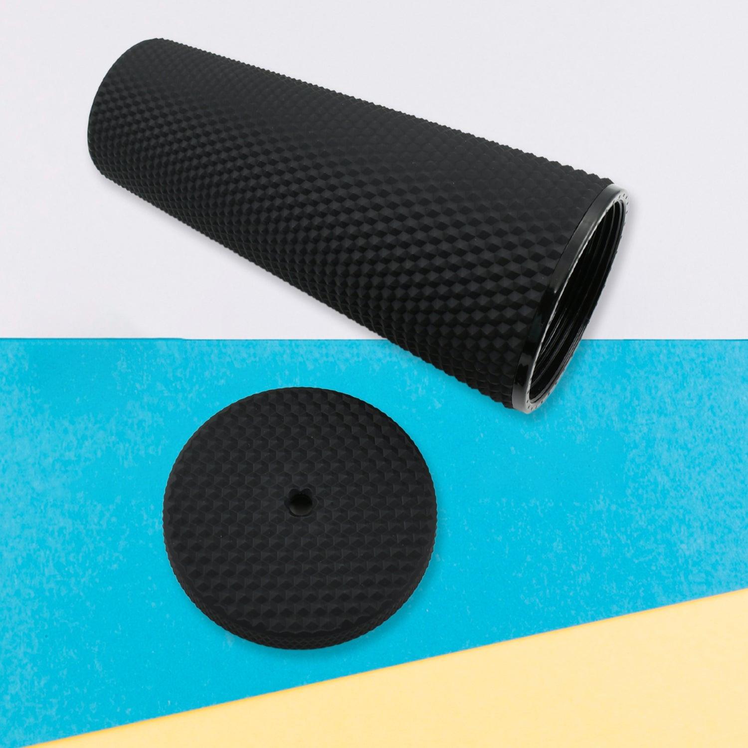 Matte studded tumbler with straw in black featuring a textured design for easy grip