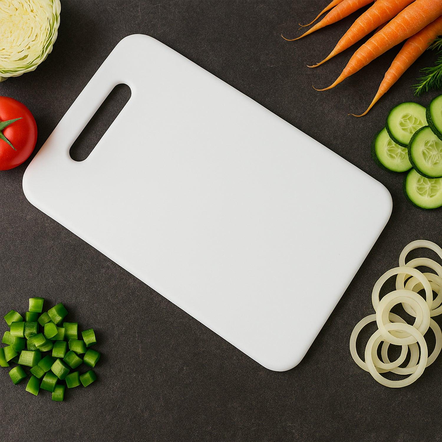 Superior eMart medium chopping board on a dark surface with fresh vegetables for meal prep