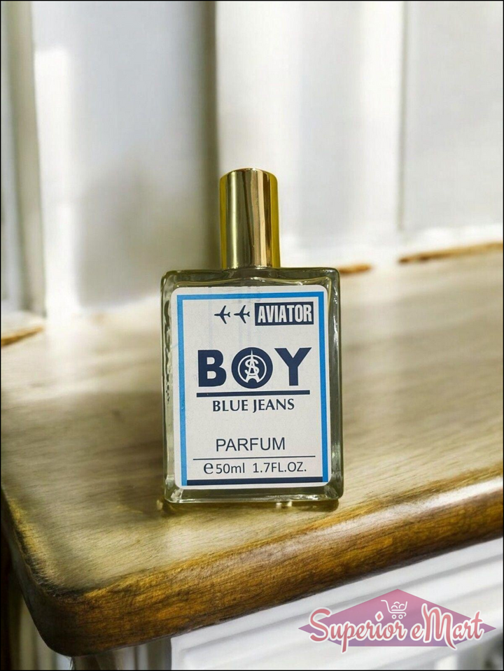 Aviator Boy Blue Jeans fragrance 50ml bottle on a wooden surface showcasing its stylish design