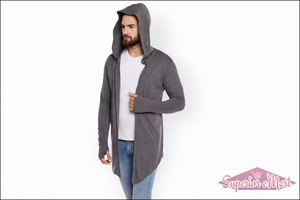 Man wearing a dark gray hooded cardigan over a white shirt on a white background