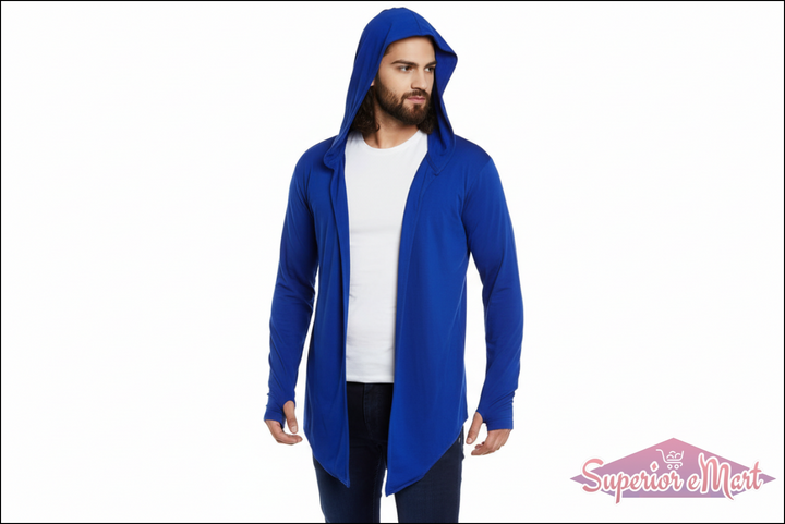 Man wearing a blue hooded cardigan over a white shirt on a white background